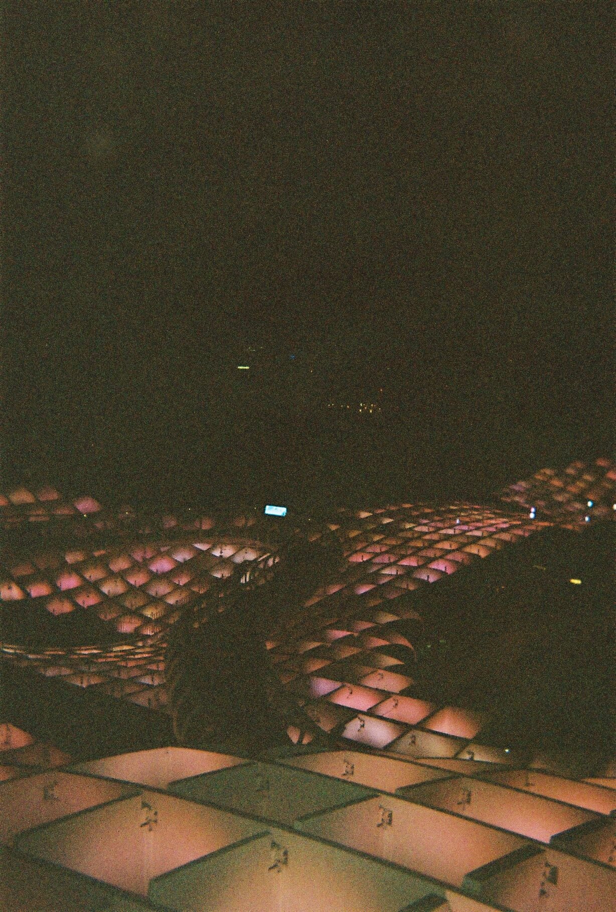 Night view of the Metropol Parasol in Seville with glowing panels